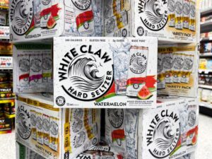 Boxes of White Claw on supermarket shelves